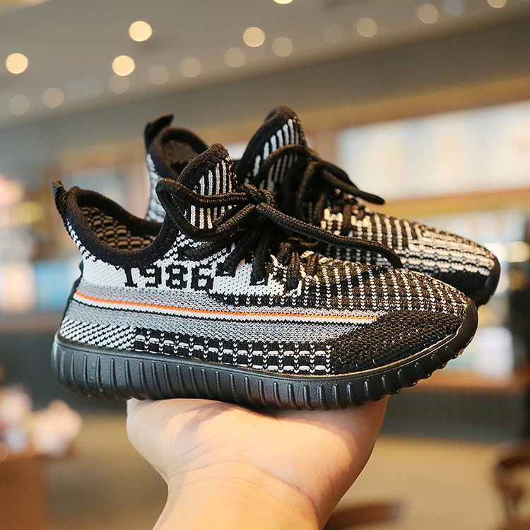 Flying woven sneakers girls shoes boys shoes mesh shoes.