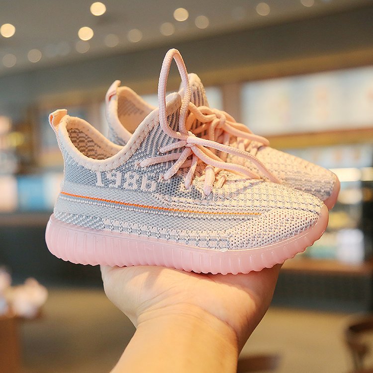 Flying woven sneakers girls shoes boys shoes mesh shoes.